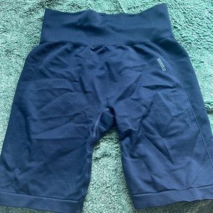 Navy blue gym shark shorts, size medium.